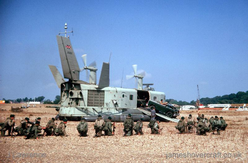 The SRN3 with the Inter-Service Hovercraft Trials Unit, IHTU - Troops taking up defensive positions around the craft (credit: Pat Lawrence).